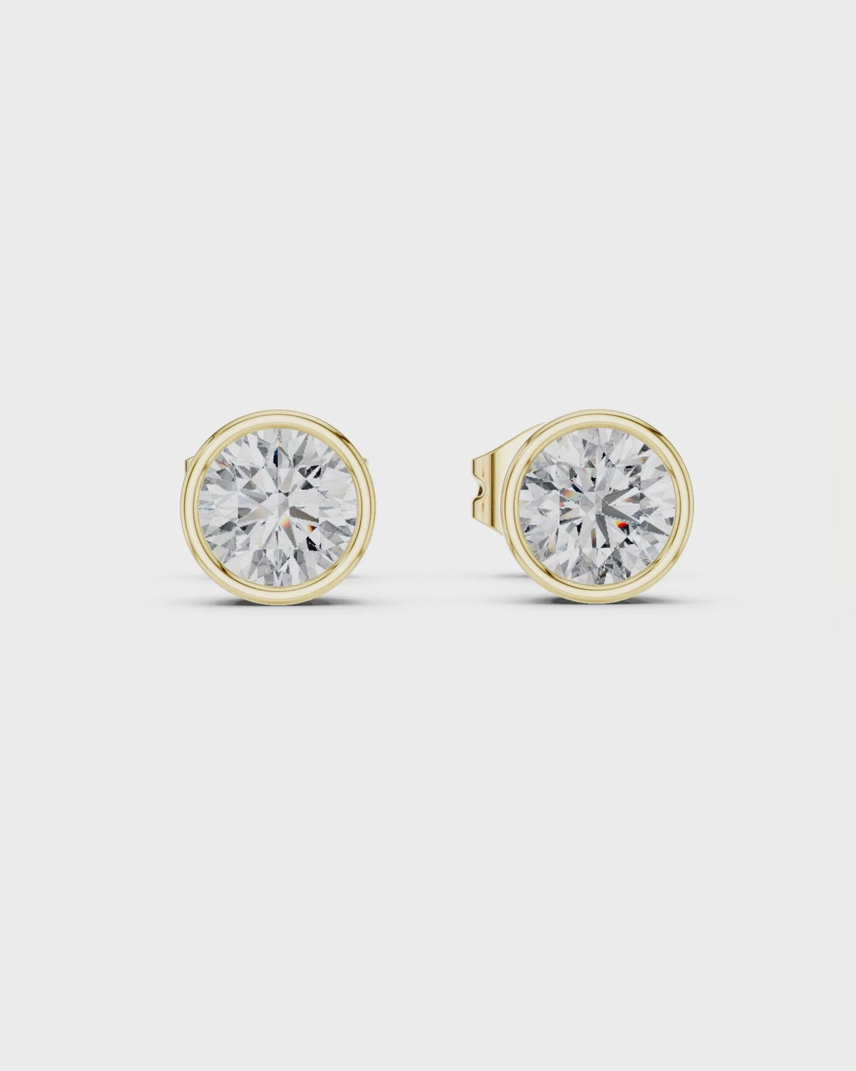 Round Bezel Diamond Stud Earrings by MONICONIC
