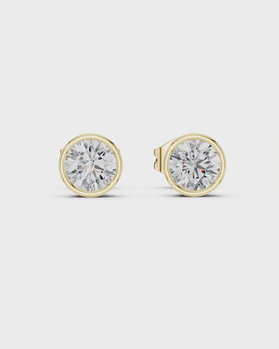 Round Bezel Diamond Stud Earrings by MONICONIC